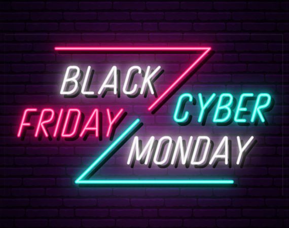 titles with neon lights showing Black Friday vs Cyber Monday
